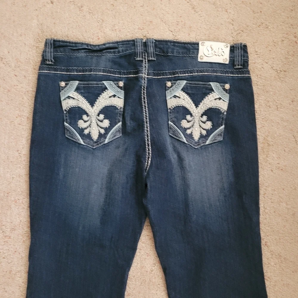 Cello Embroidered Pocket Bootcut Raw Hem Jeans Dark Wash